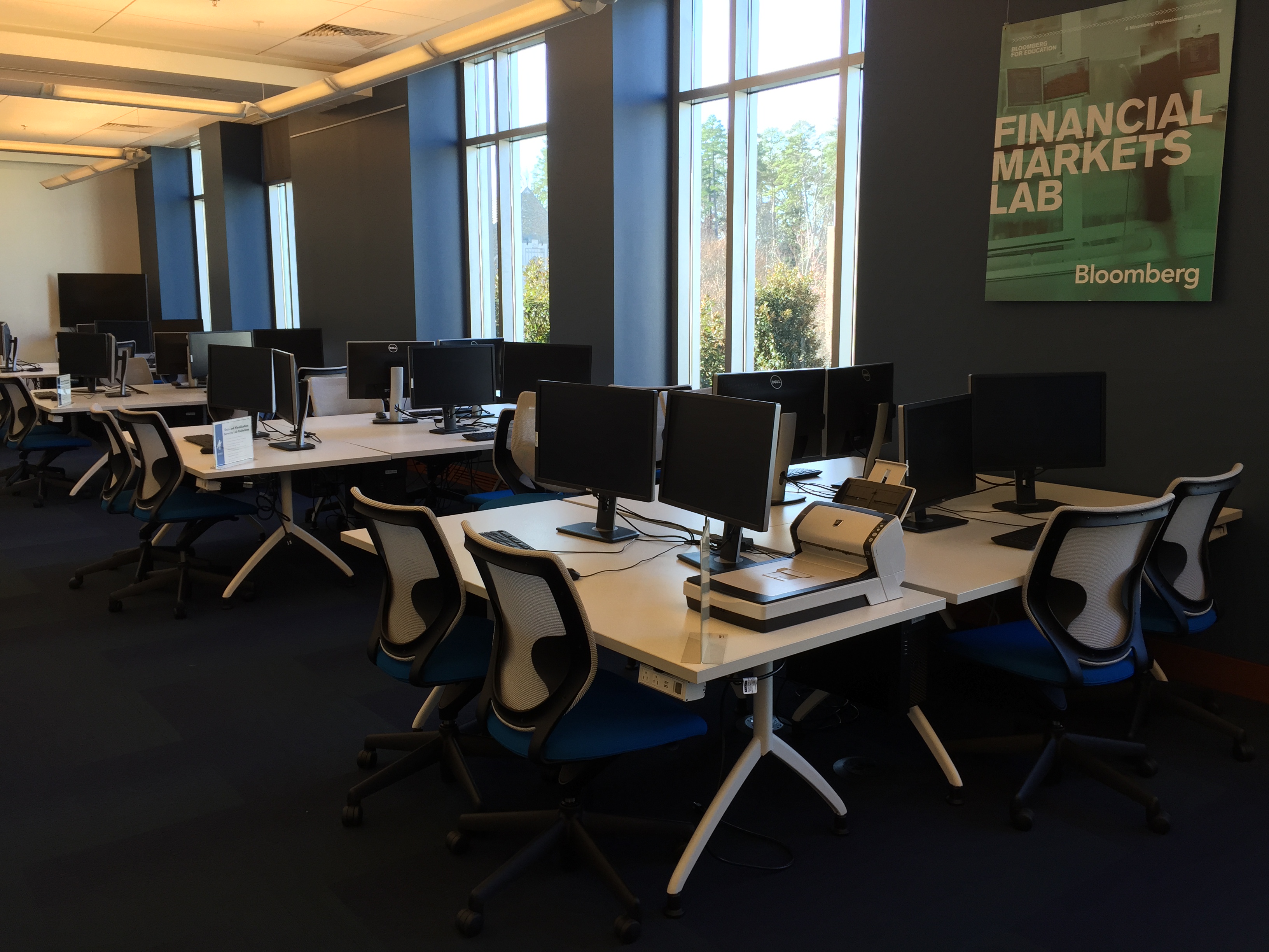 modern computer lab with data visualizations