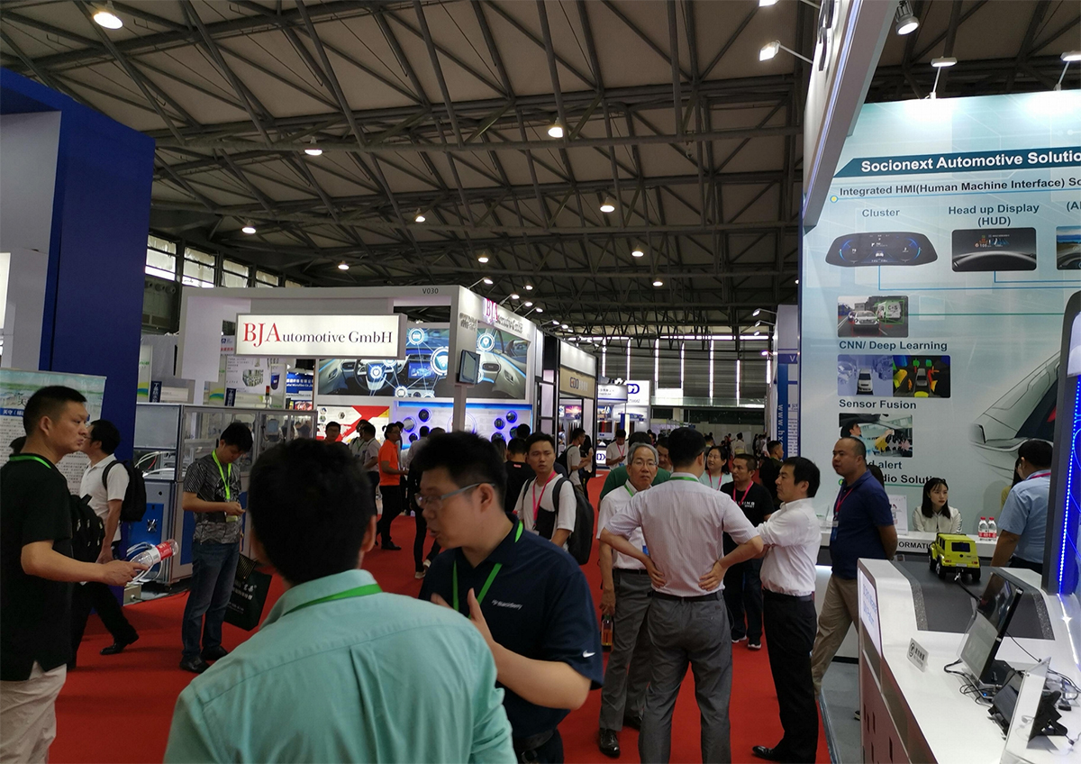 automotive factory interior and business meeting
