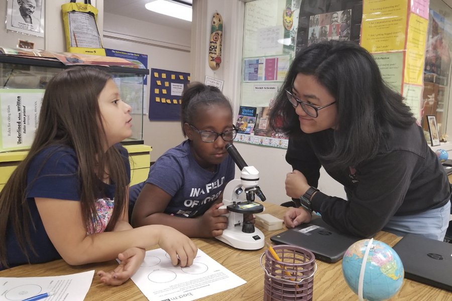 Older students participating in a hands-on STEM project
