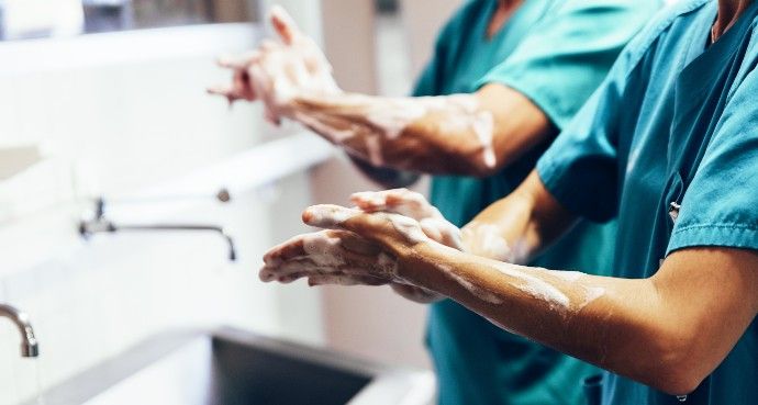 surgical team hand scrubbing