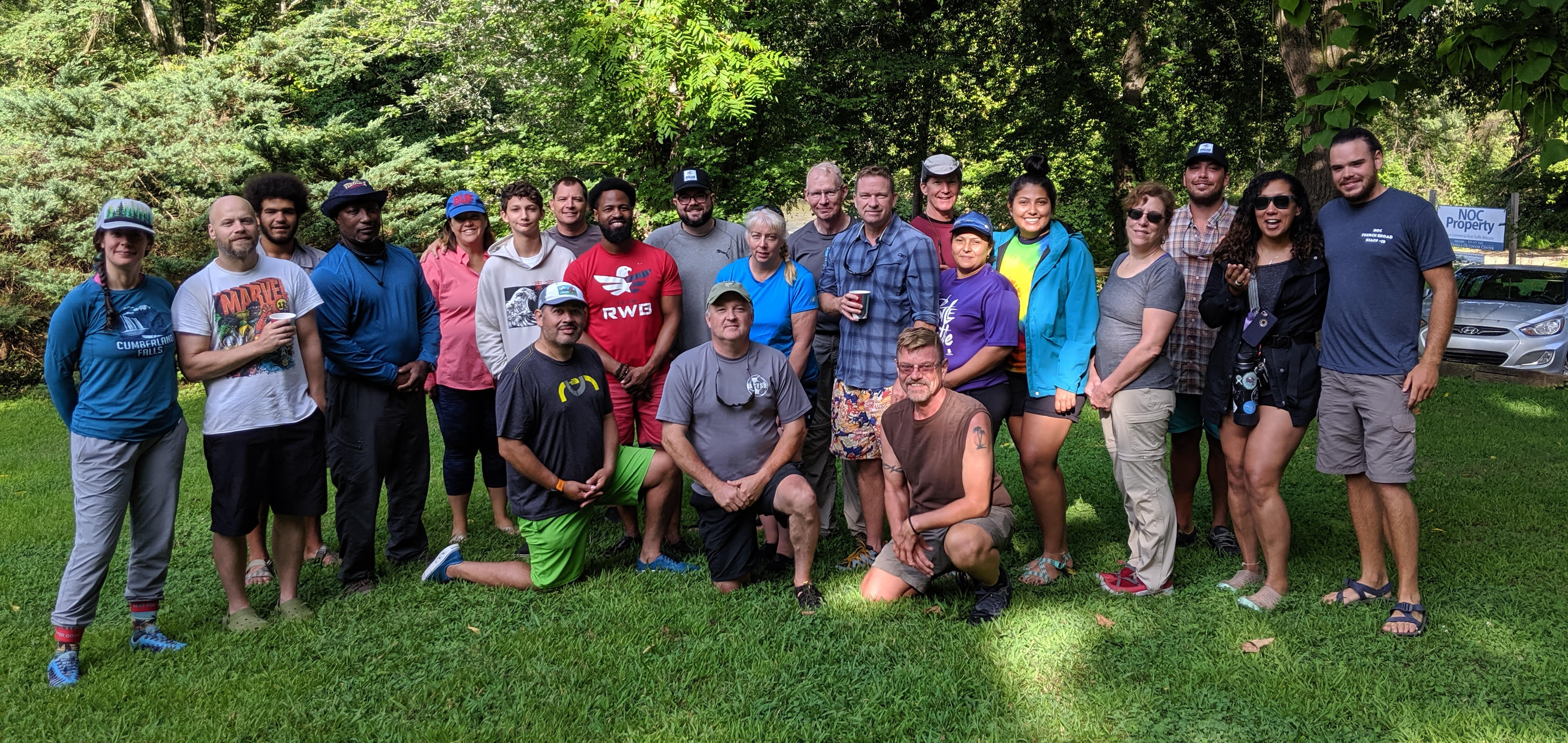 community meeting outdoors with people