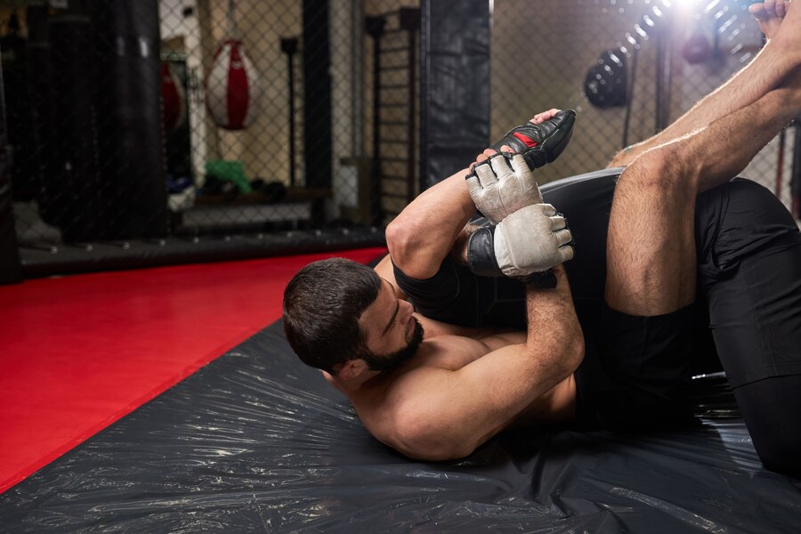 MMA fighters in action, striking and grappling technique