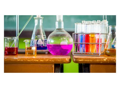 chemical laboratory equipment with reactions and temperature gauges