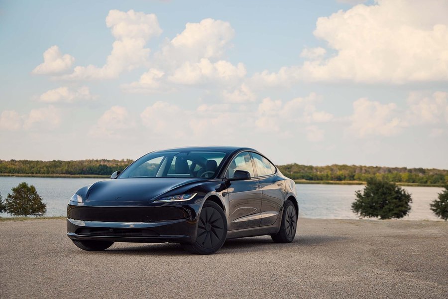 The minimalist interior of the 2026 Model 3, highlighting the central display.