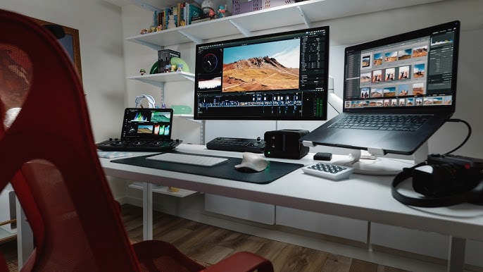 editing desk with notes and computer