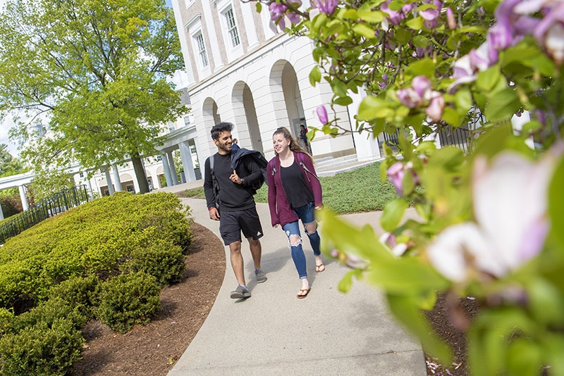 scenic campus building with students