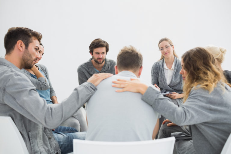 therapy session with patients in discussion