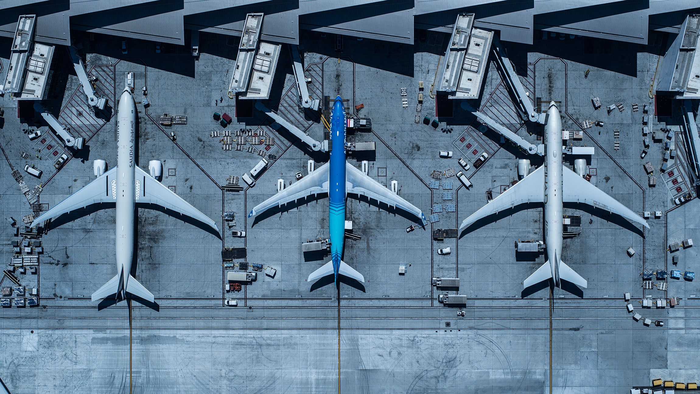 aerial view of airport and airplanes