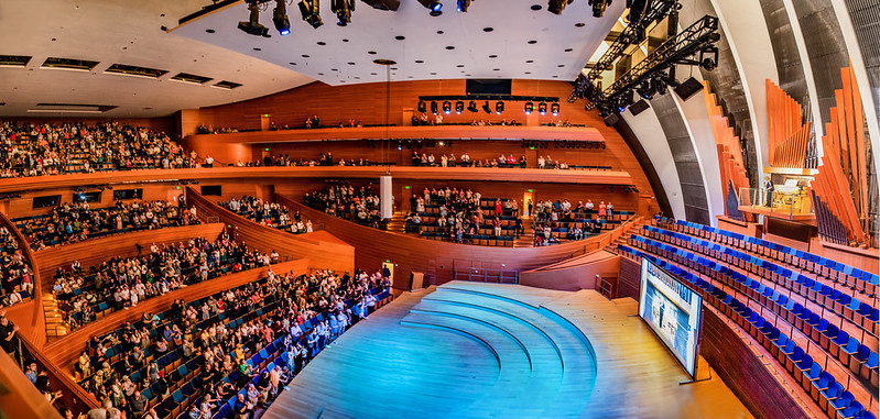 modern concert stage with digital ticketing display