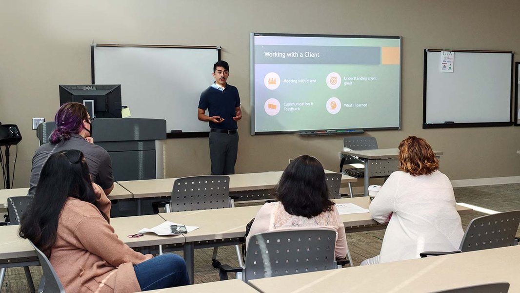 Students presenting research at a conference