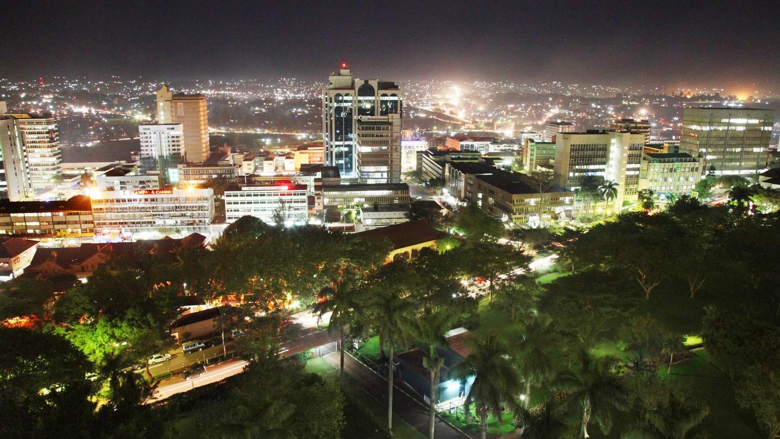 Uganda cityscape with police patrols and tourist attractions