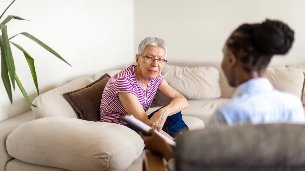 Therapist and client engaged in a therapy session