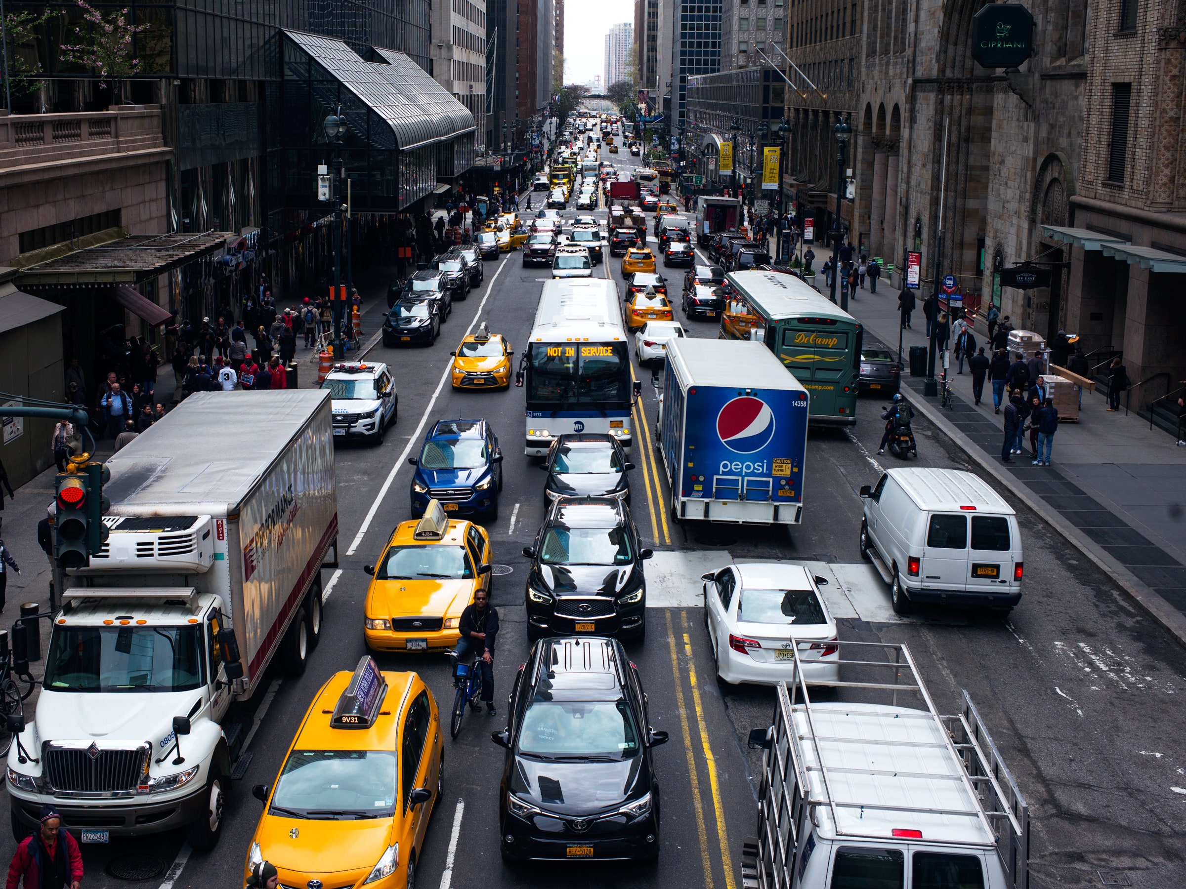 uber vehicles on city street