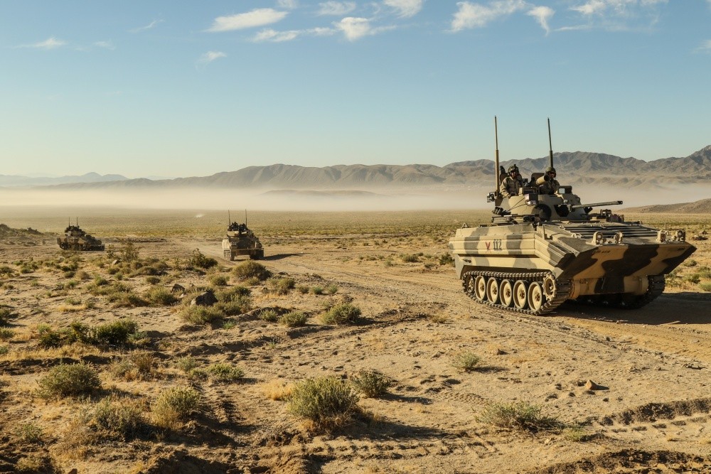 military vehicles and conflict landscapes