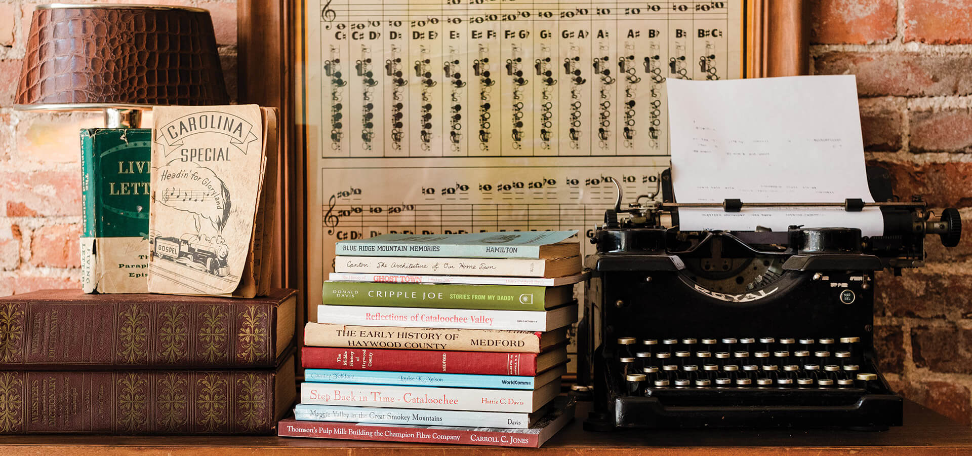 mountains book stack vintage typewriter