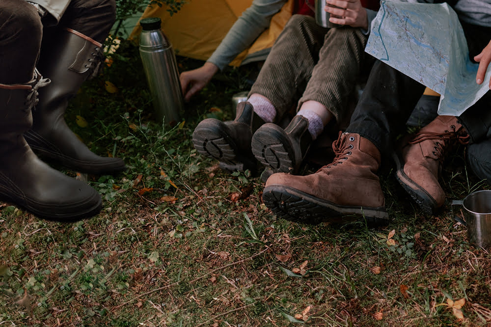 variety of boots on flat surface