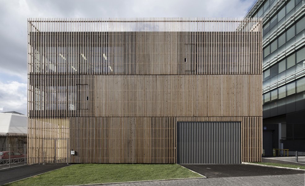 Modern architectural design of a media archive building, symbolizing structured digital knowledge storage.