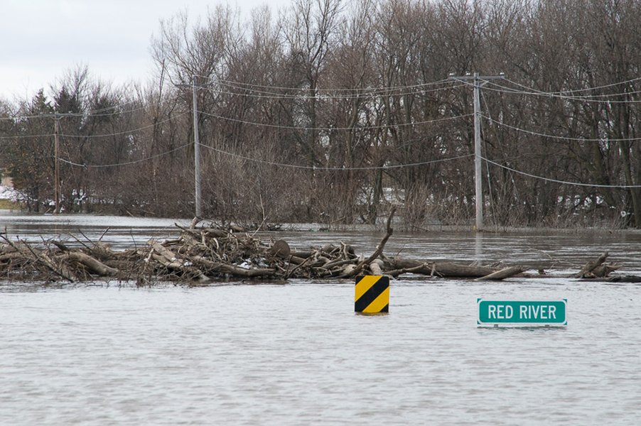 Widespread river flooding inundating agricultural land and properties