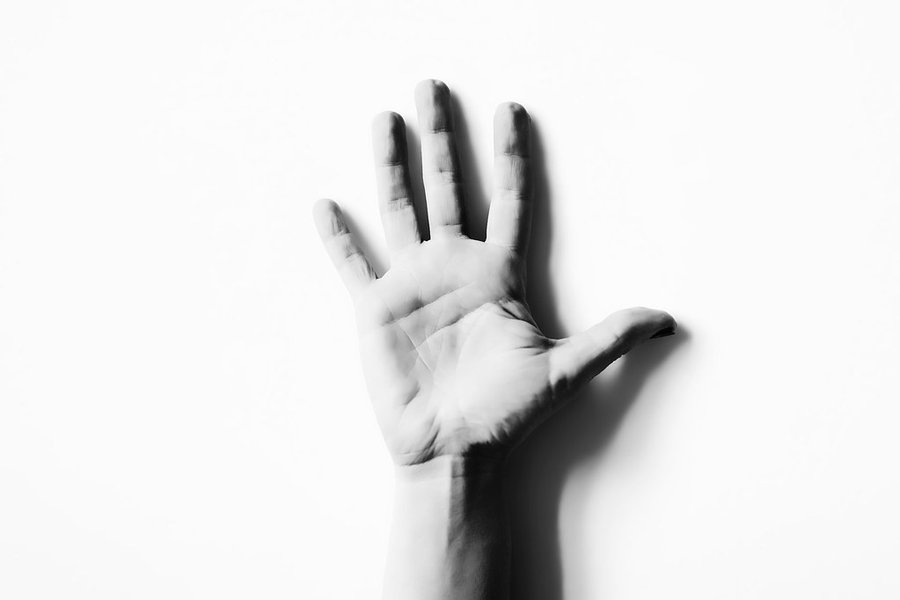 Hand reaching out in greeting