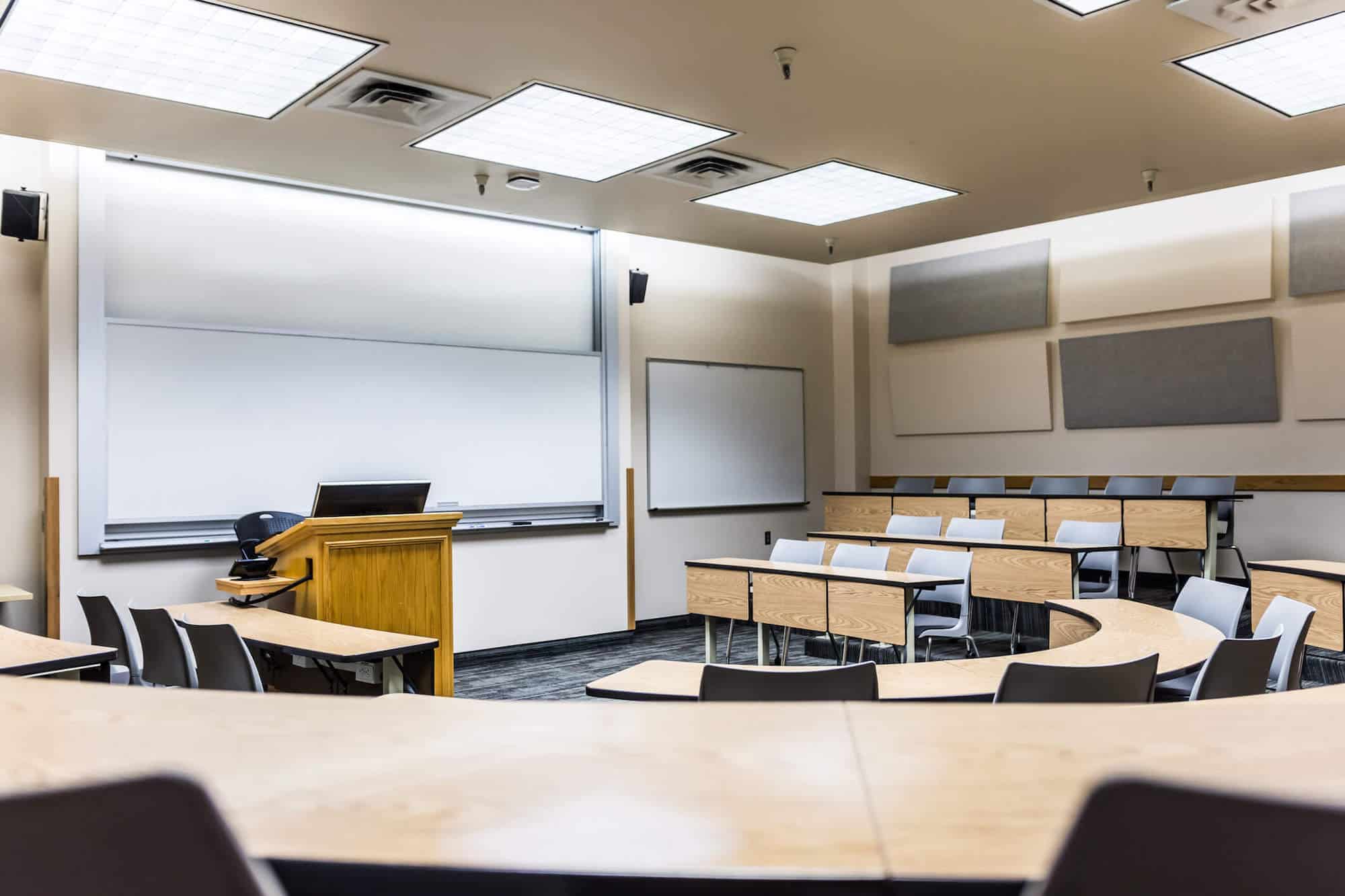 historic university campus architecture modern classroom digital devices