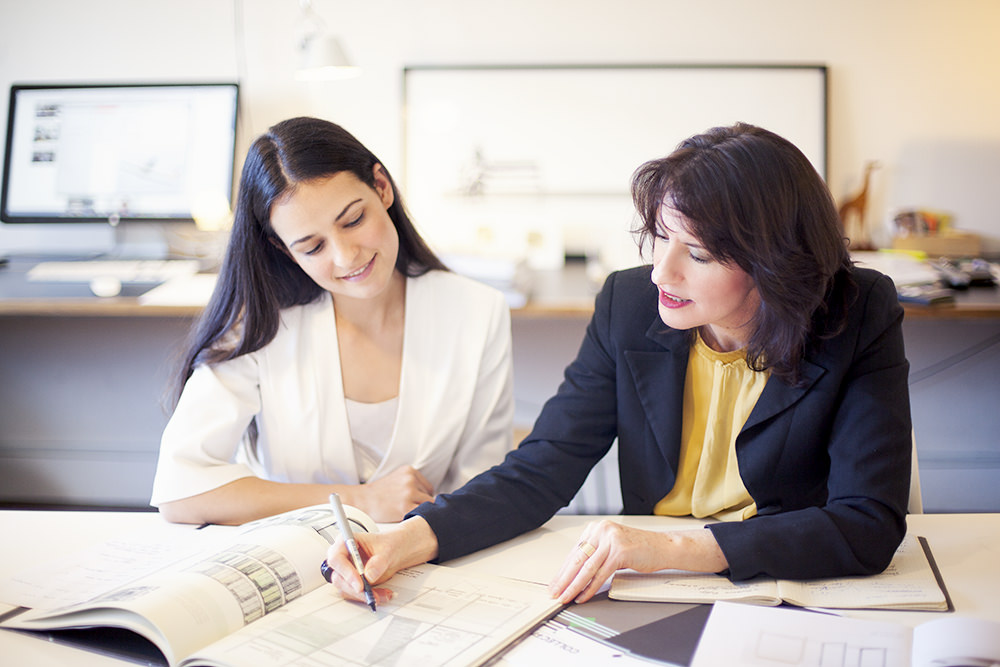 architects consulting with clients