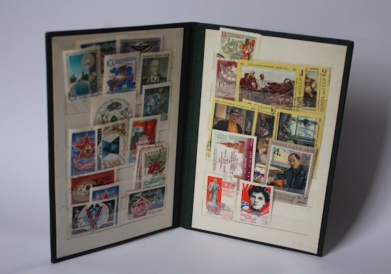vintage postal stamps display with collectors