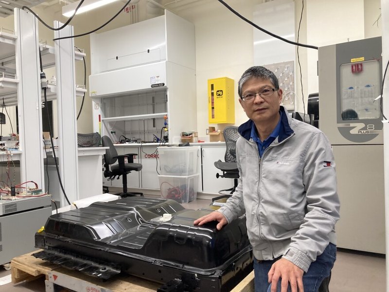 An EV charging, symbolizing the critical need to test charging capabilities during inspection.