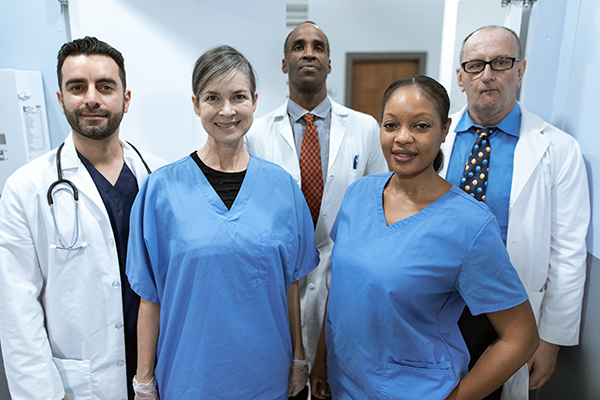 diverse healthcare professionals vaccine clinic