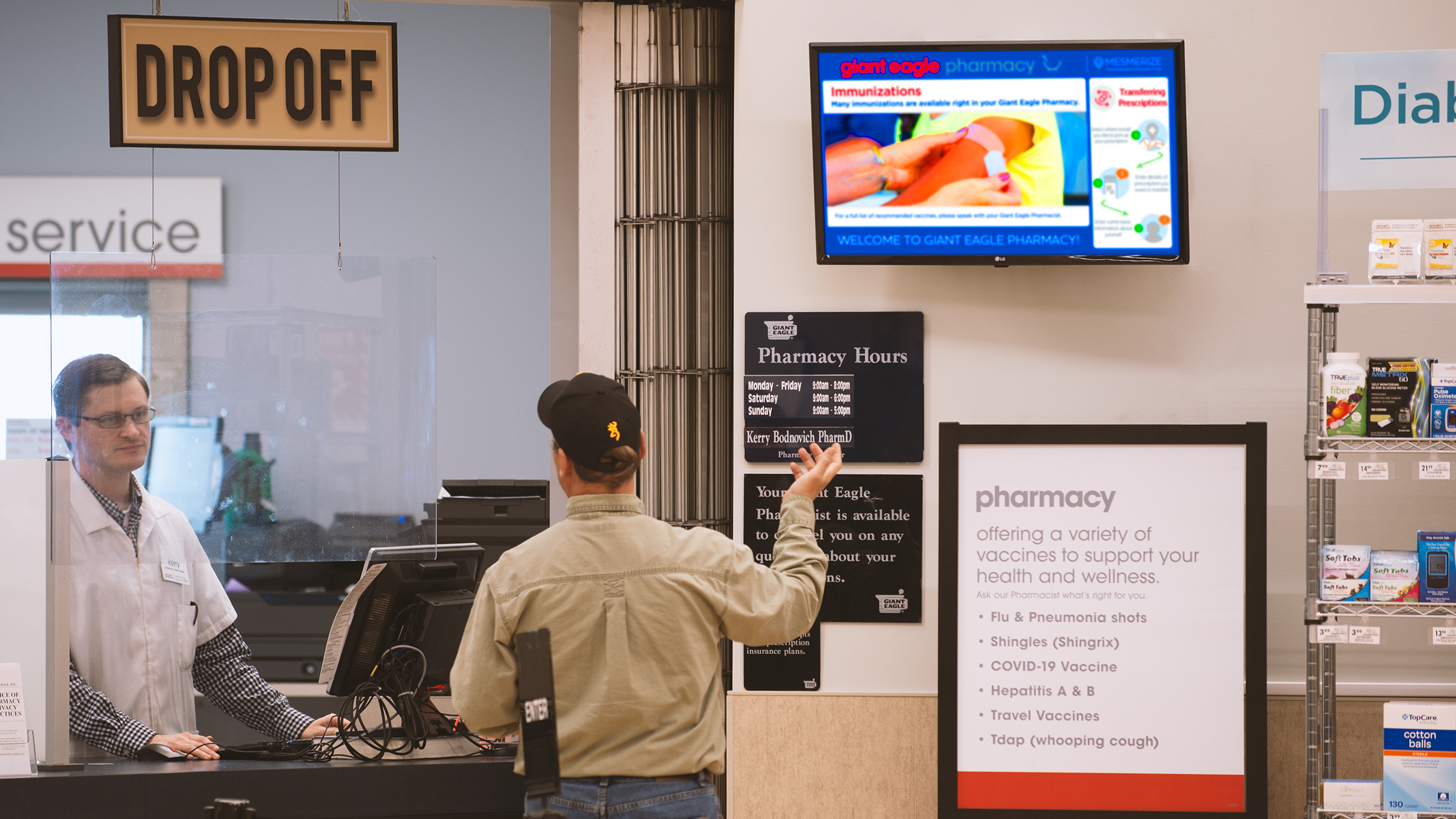 vaccination center, healthcare professionals, digital marketing screen