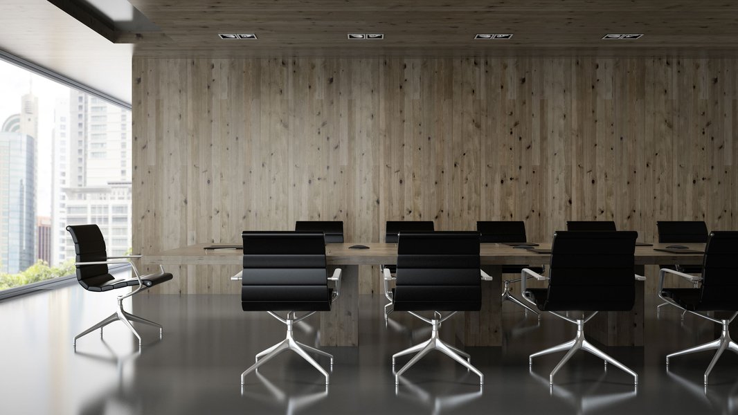 Investment team meeting around a table