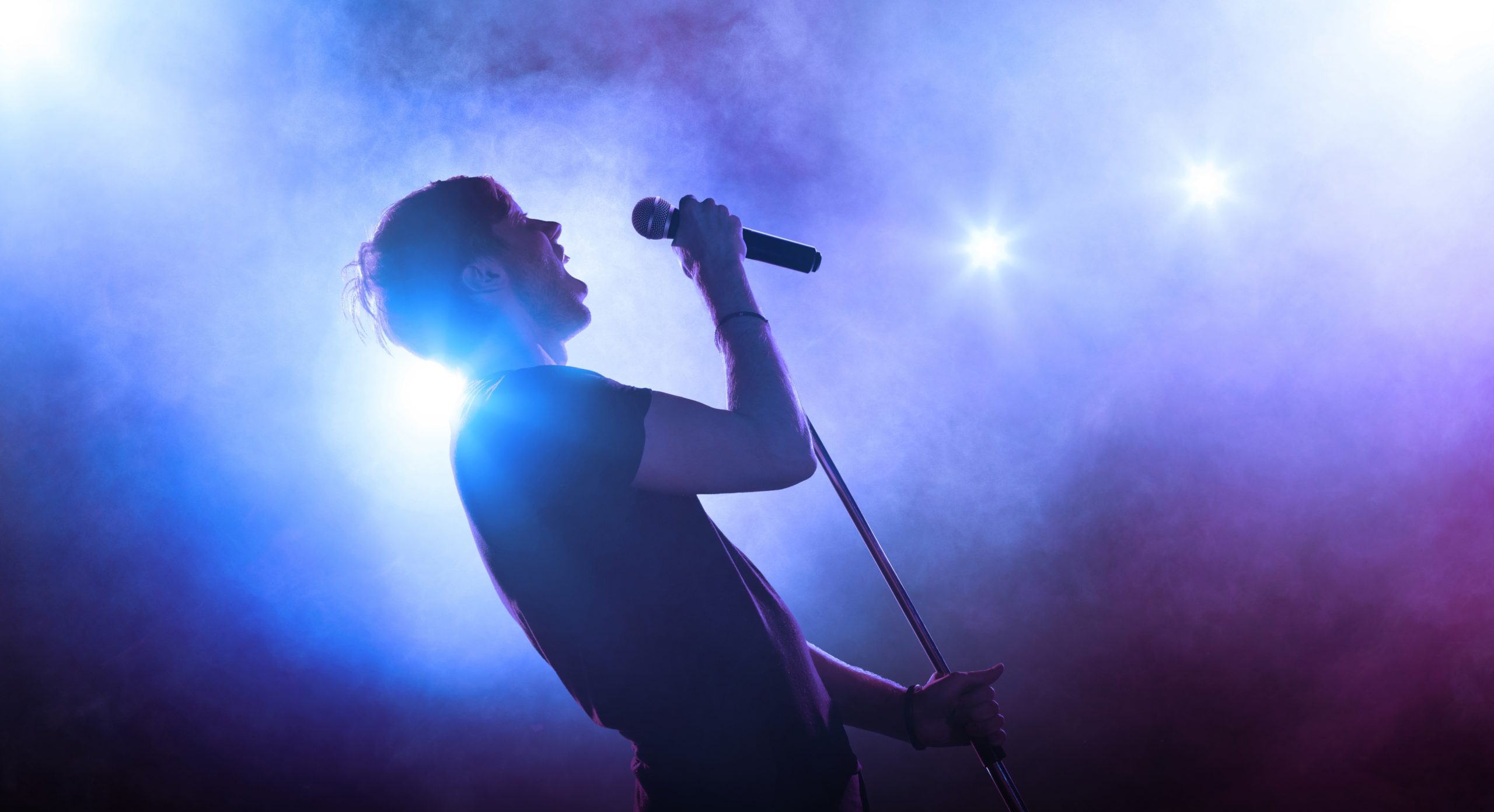 singer performing on stage