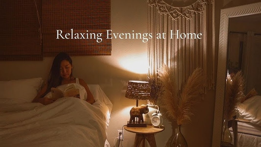 Cozy evening scene with warm lighting and a book