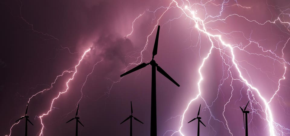 energy wind turbines stormy sky