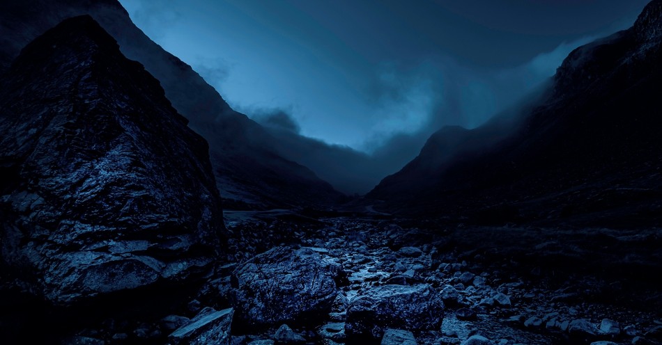 well, rocky terrain, deep shadows
