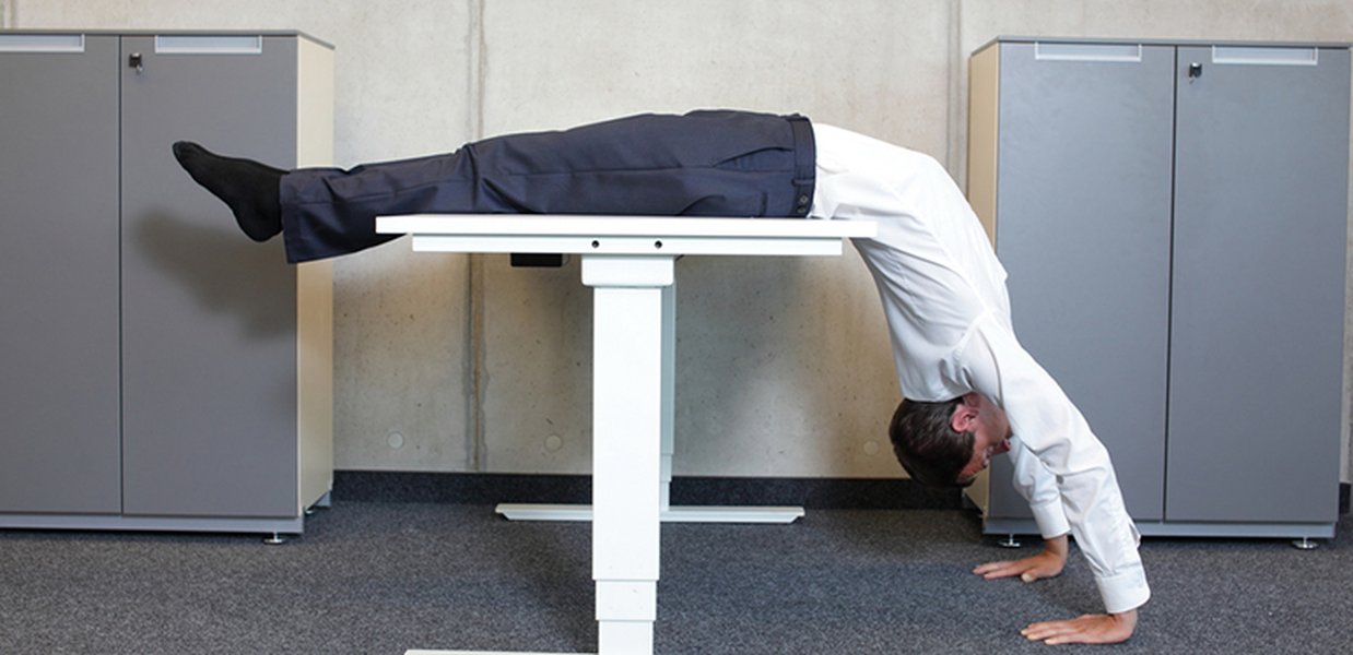 Two people working collaboratively in a flexible office space