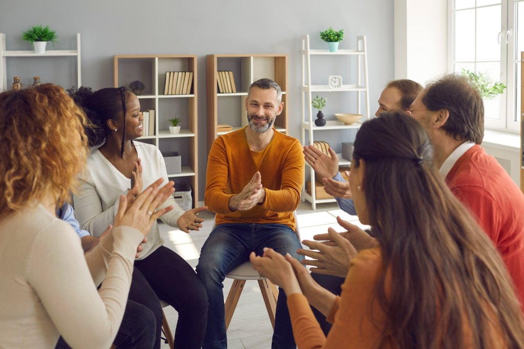 therapeutic group session, philosophical book and therapy room