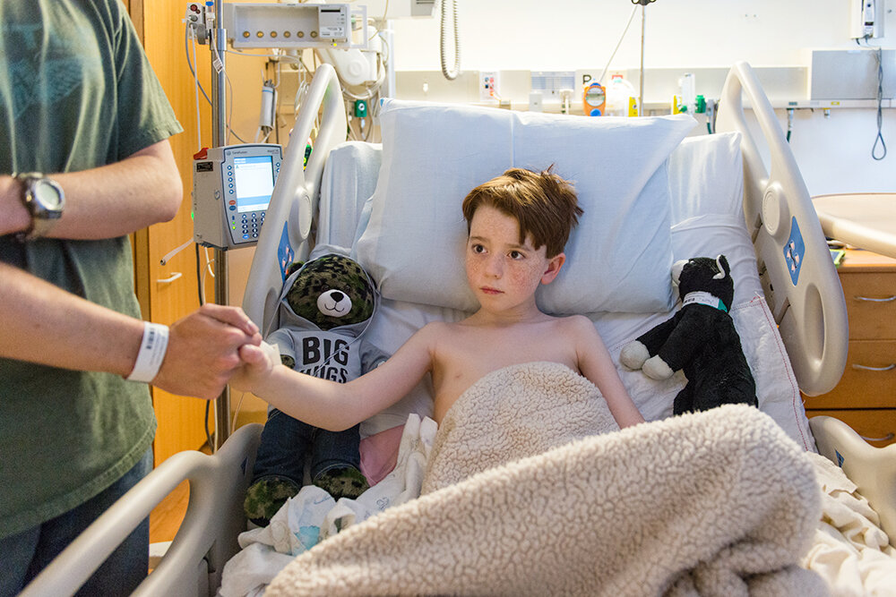 child in hospital bed