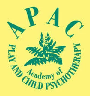 Logo of the Association for Play Therapy (APT), featuring the acronym "APT" above a stylized fern and the words "Play and Child Psychotherapy" and "Academy of" encircling the fern.
