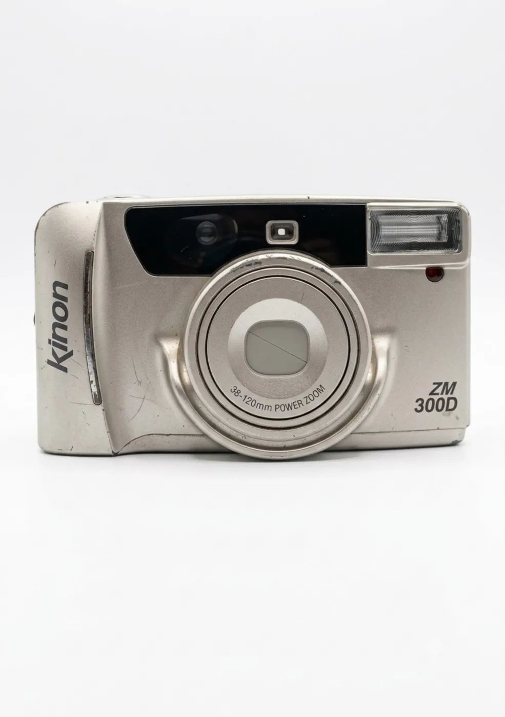 كاميرا فيلمية كلاسيكية Kinon ZM 300D (بالة أنتيك) ​الوصف: كاميرا فيلمية (35mm) أنتيك ونادرة بلون ذهبي شامبين