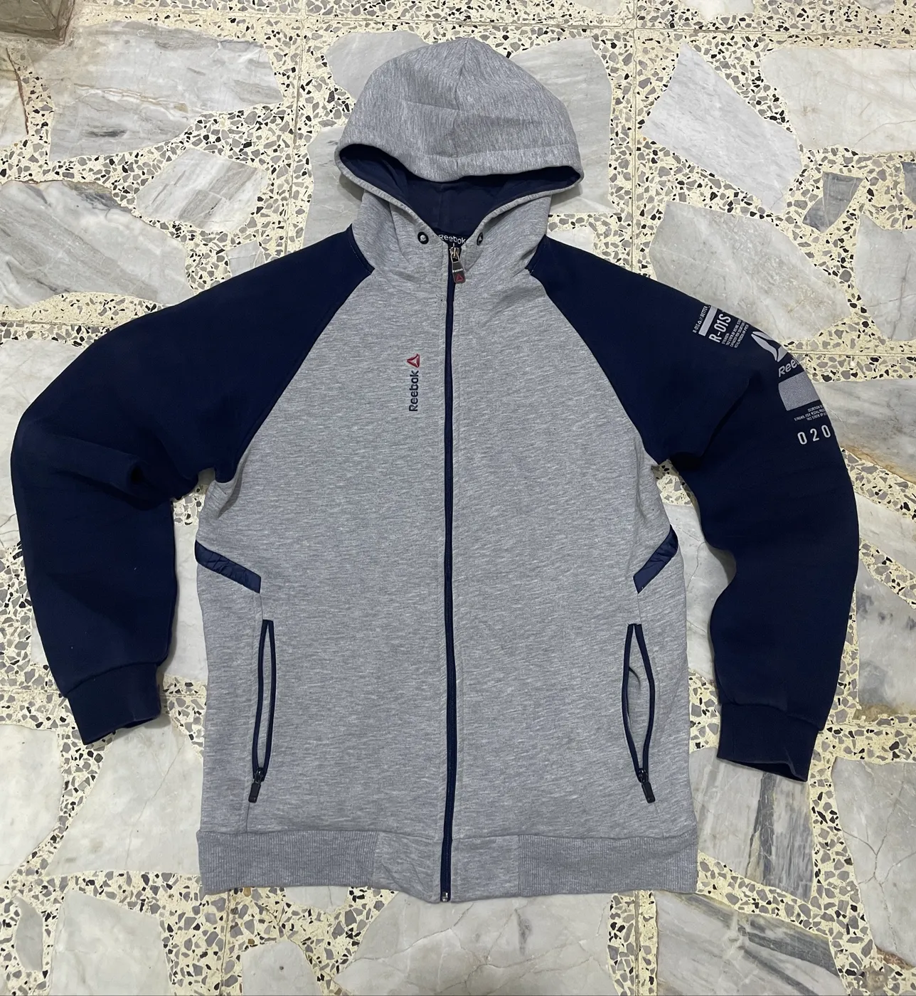 هودي رياضي بسحاب كامـل من علامة ريبوك (Reebok)
