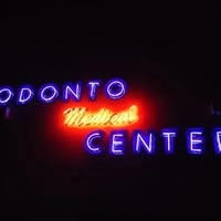 Logotipo da empresa ODONTO MEDIQUE