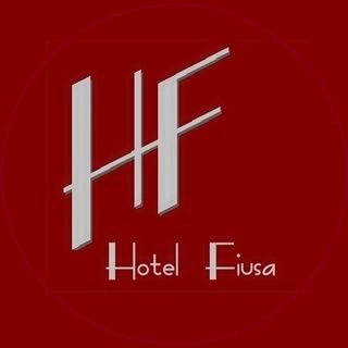 Logotipo da empresa HOTEL FIUSA