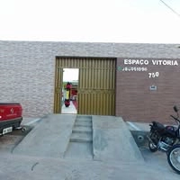 Logotipo da empresa ESPACO VITORIA MULTIEMPREENDIMENTOS