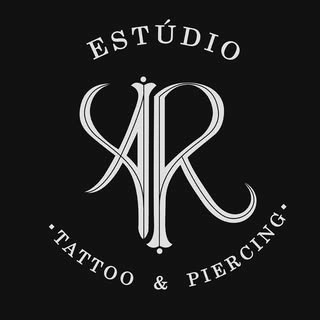Logotipo da empresa ROOTS TATTOO UBATUBA