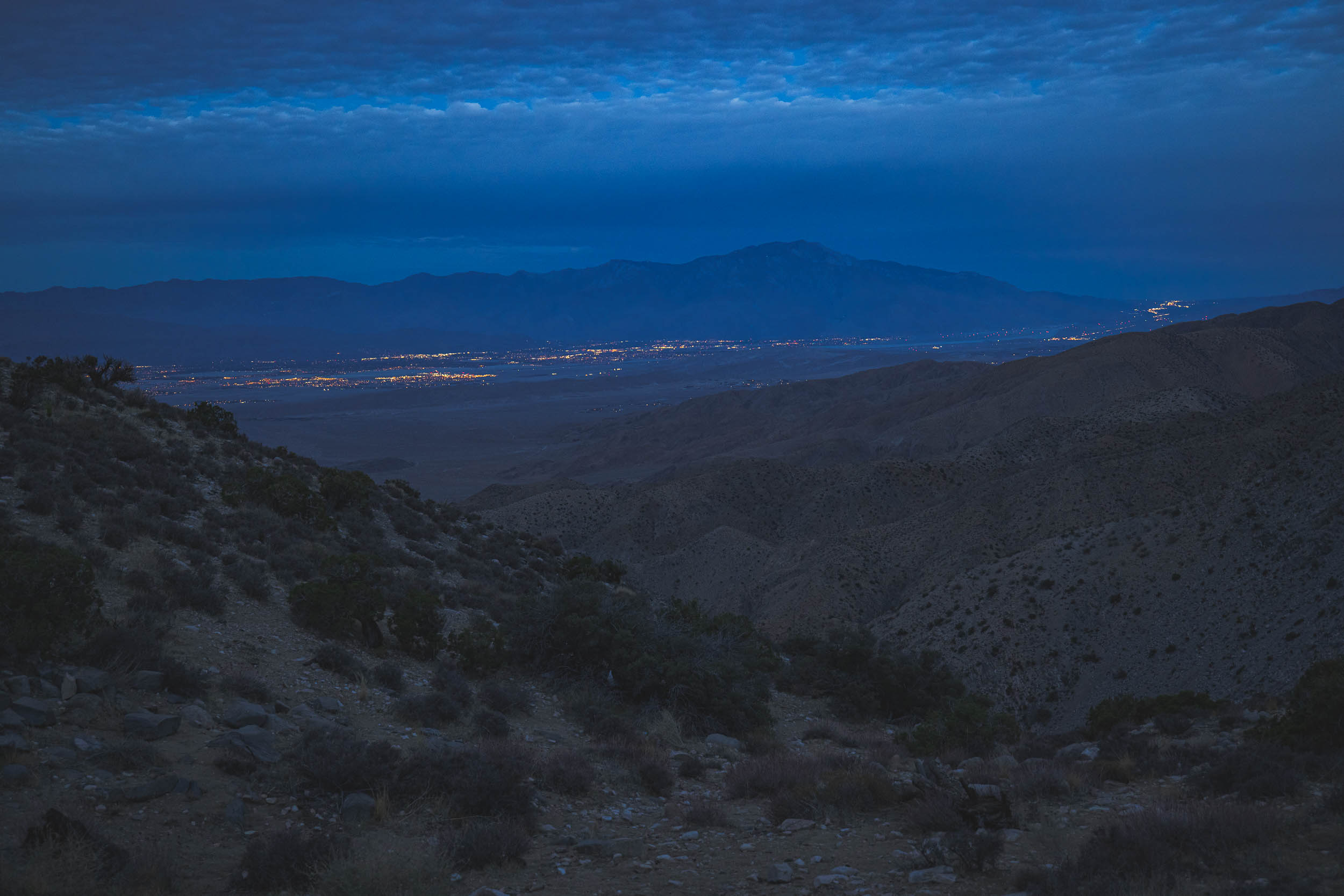 A wide angle shot of the vista from Key's View showing the lights from Palm Springs