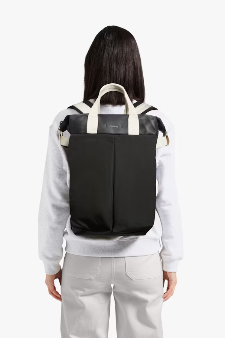 a person in all white models the tokoyo totepack black