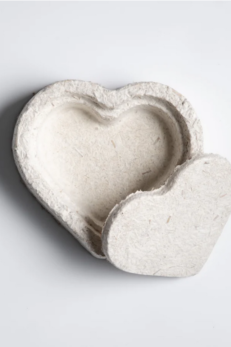a heart shaped mushroom based box in two parts