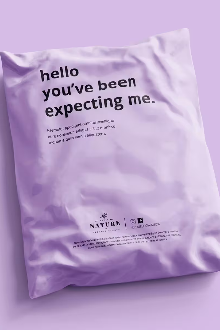 a pale purple compostable polybag that reads "hello you've been expecting me" in black ink.