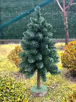 Настільна штучна ялинка Elegant на пеньочку 65см зелена