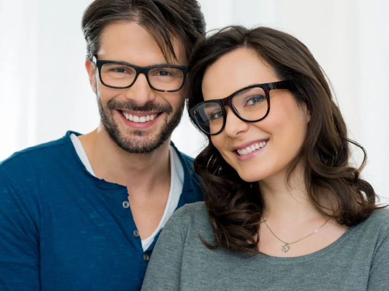 Young couple wearing designer eyewear.